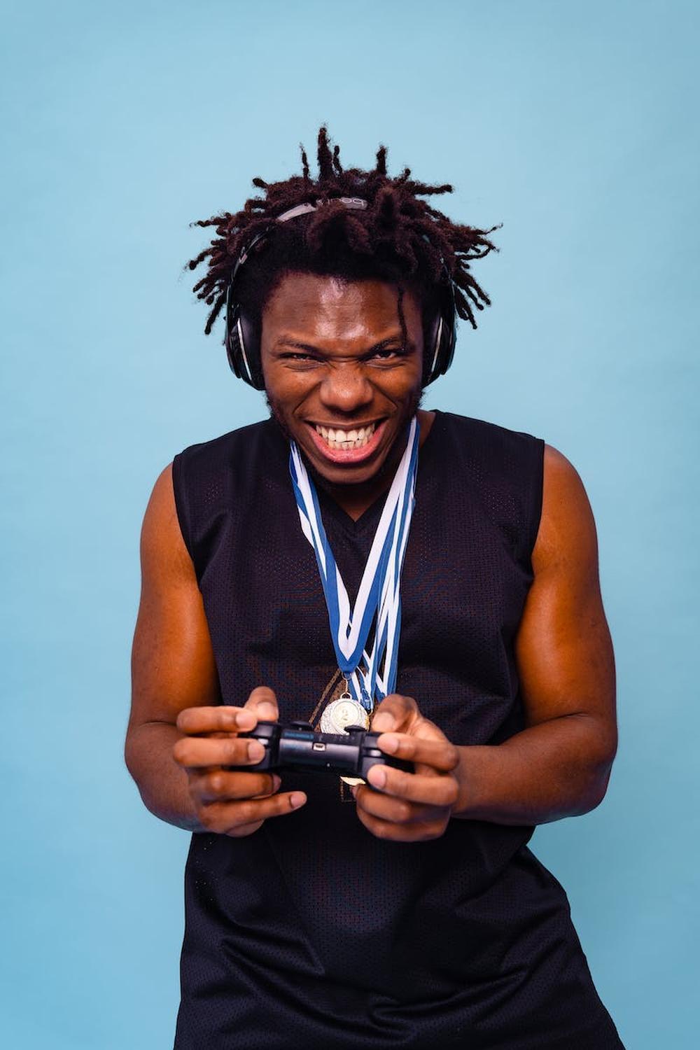 a_man_winning_medals_in_gaming