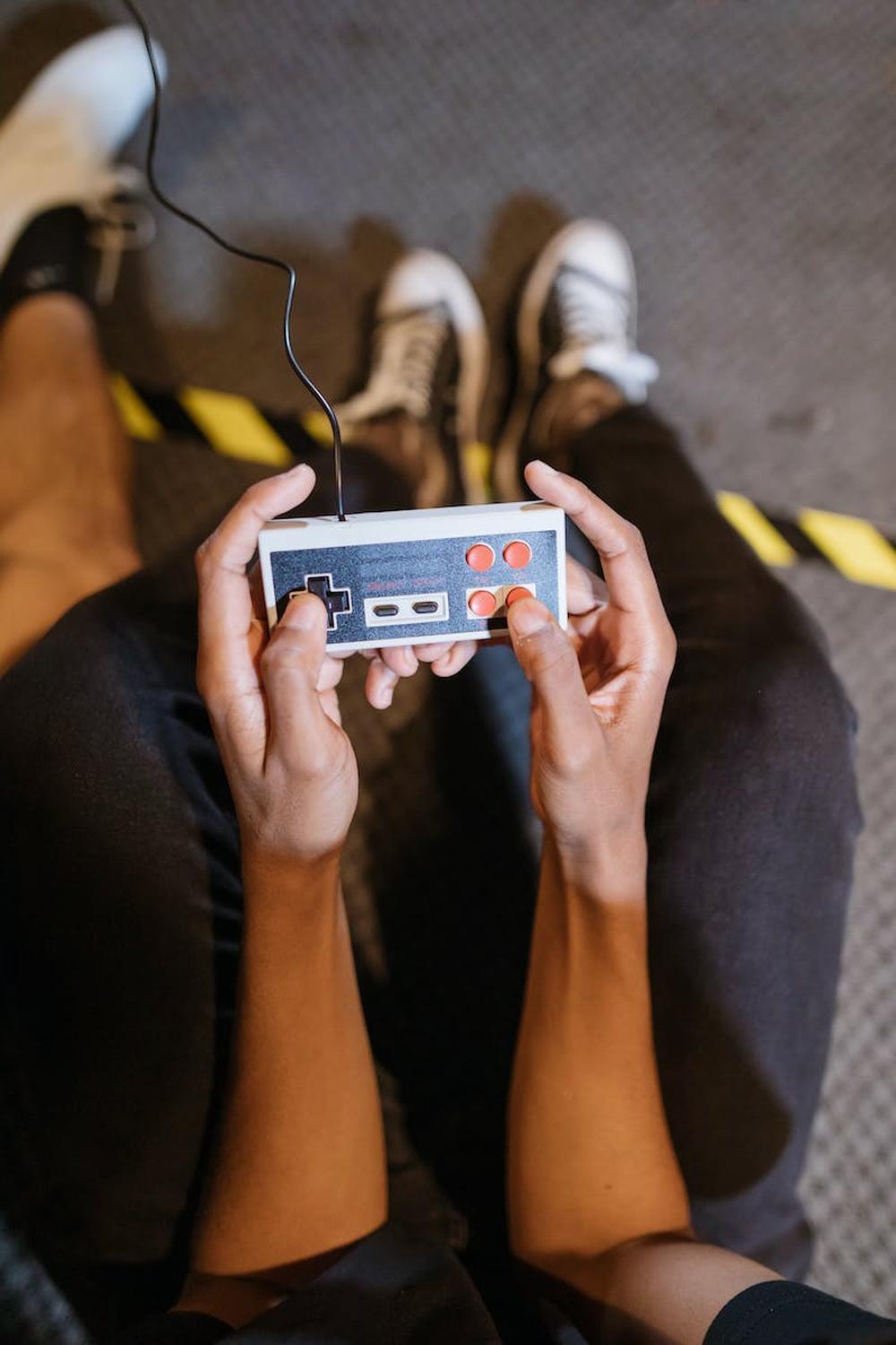 close_up_view_of_a_person_holding_game_controller
